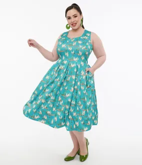 Dolly & Dotty 1950s Turquoise Meerkat Print Amanda Swing Dress