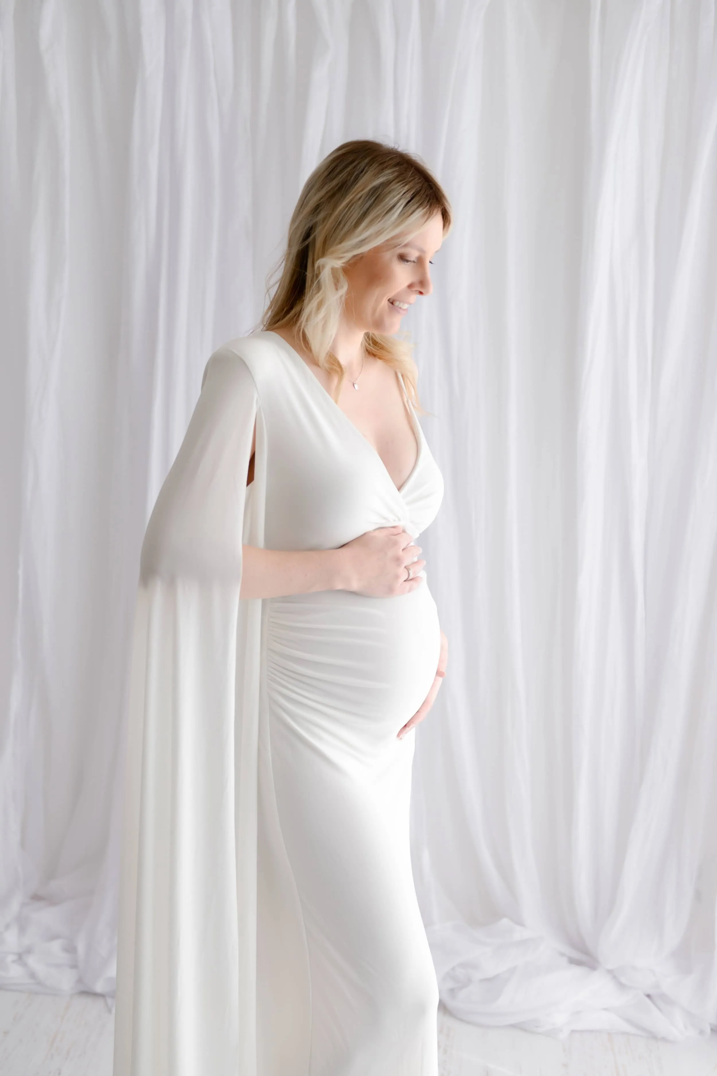 The Crown Plunge Maternity Maxi Dress with Cape Sleeve