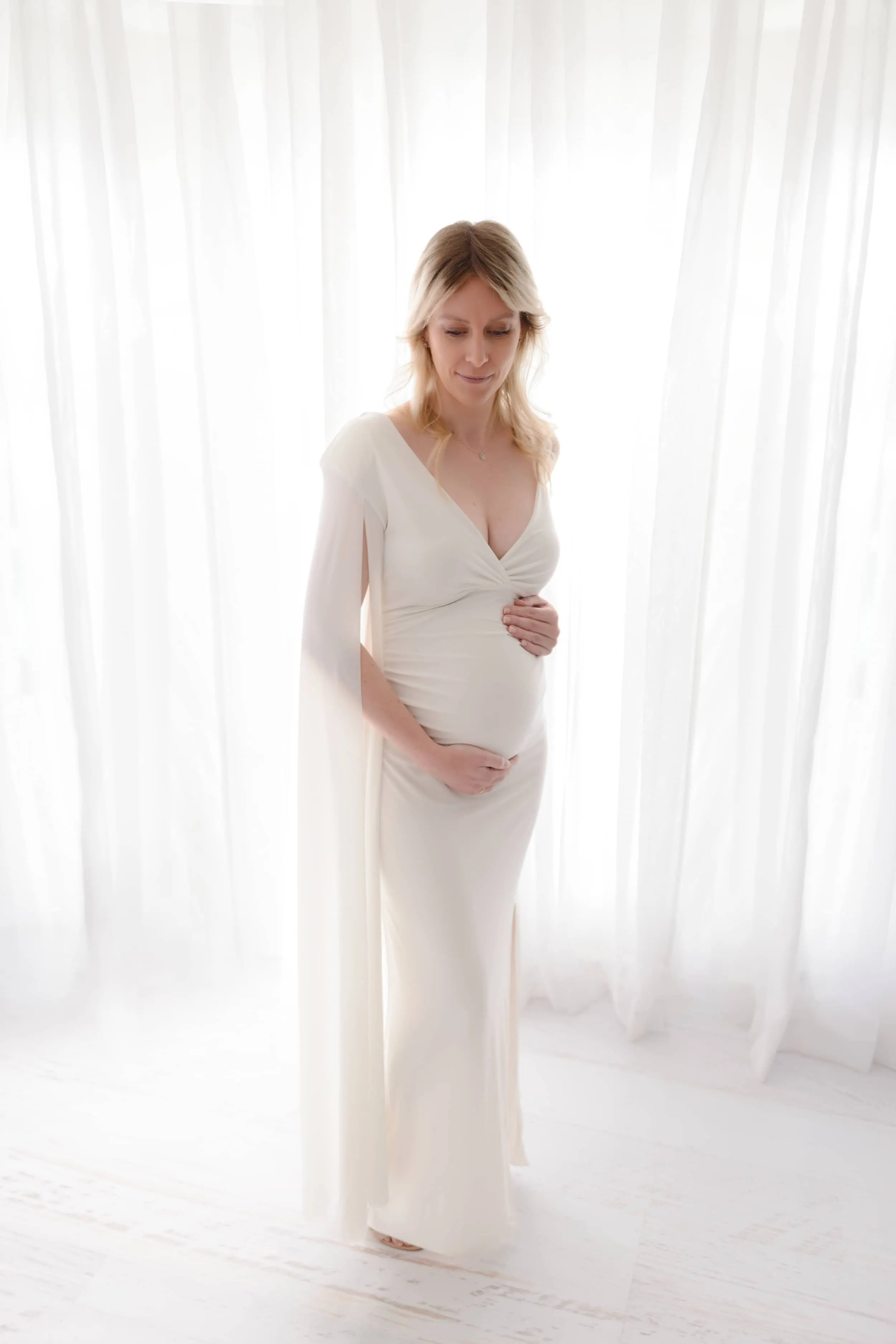 The Crown Plunge Maternity Maxi Dress with Cape Sleeve